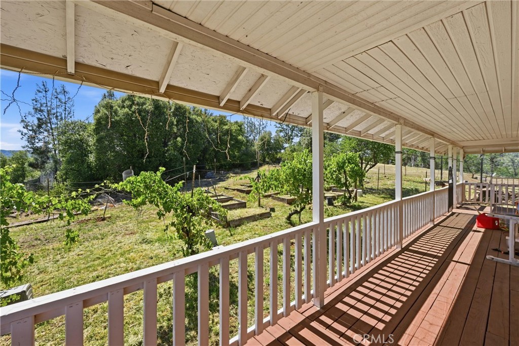 16965 Spruce Grove Road Hidden Valley Lake, CA 95467 - Photo 5 of 34 a view of a balcony with wooden floor