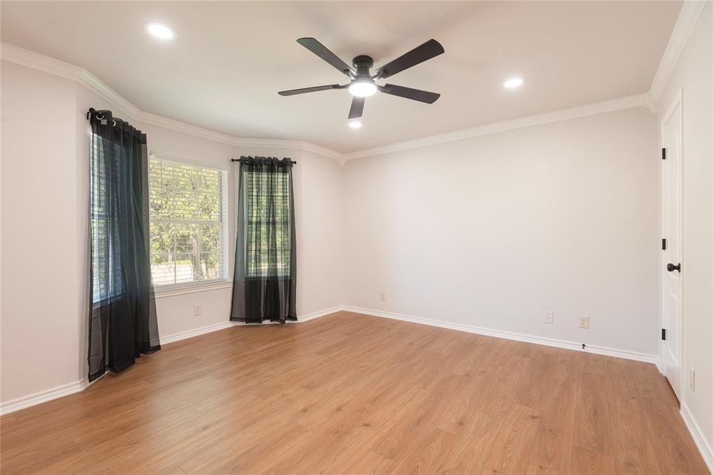 2020 Arbor Bend Road Bonham, TX 75418 - Photo 21 of 40 Spare room with a ceiling fan, ornamental molding, light wood finished floors, and recessed lighting