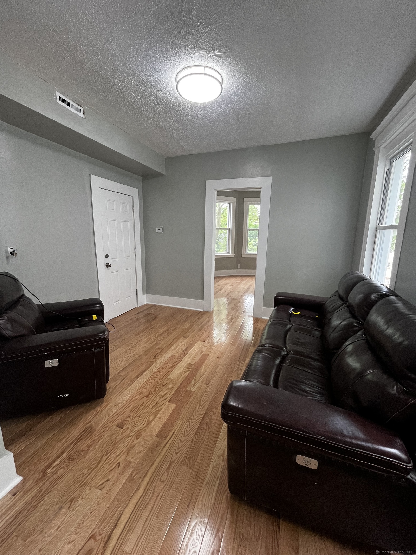 11 Truman Street, Unit 2 New Haven, CT 06519 - Photo 5 of 7 a living room with furniture and a window