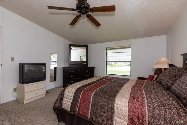 a bathroom with a sink toilet and a mirror