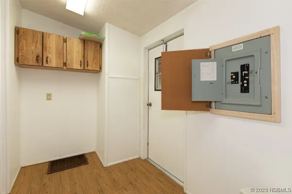 a view of entryway with wooden floor