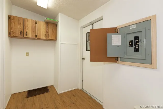 a view of entryway with wooden floor