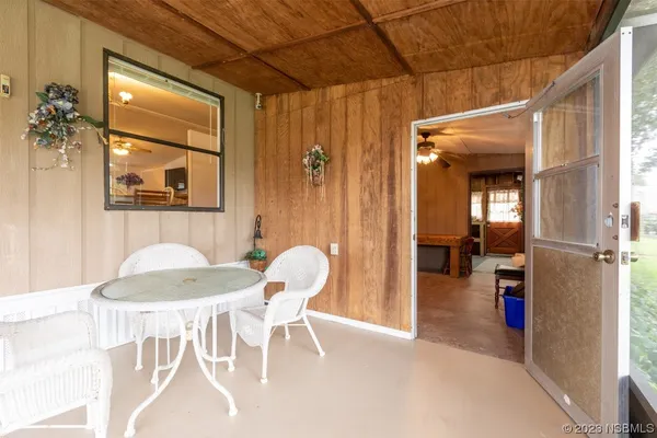 a kitchen with stainless steel appliances granite countertop a refrigerator and a stove