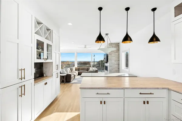 a view of living room with furniture and floor