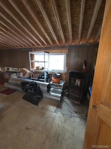 a view of parking garage with cars parked