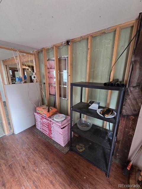 325 Aspen Road Idaho Springs, CO 80452 - Photo 10 of 10 a living room with furniture and wooden floor