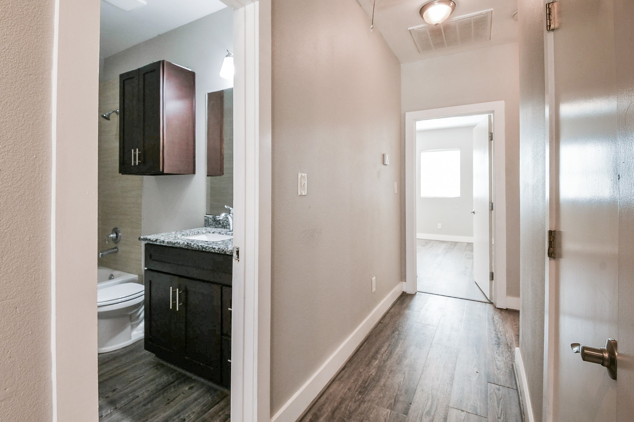 3249 Dixie Drive, Unit B Houston, TX 77021 - Photo 13 of 25 a bathroom with a sink and a mirror