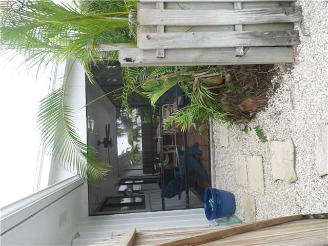 4561 Southeast Shady Ridge Lane Stuart, FL 34997 - Photo 8 of 25 a view of outdoor space with seating area