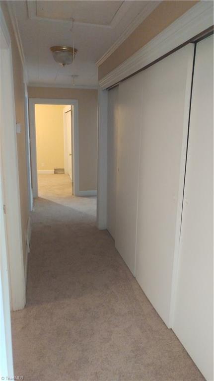 273 Milling Road Mocksville, NC 27028 - Photo 11 of 22 Hallway of closets to the right on the way to the bedrooms