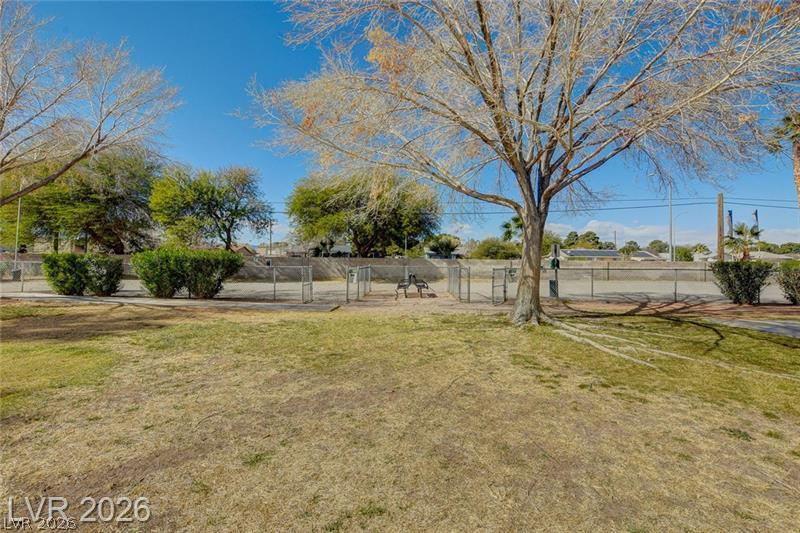 3318 North Decatur Boulevard, Unit 2152 Las Vegas, NV 89130 - Photo 46 of 58 A fenced dog park provides a dedicated space for pets to play and socialize.