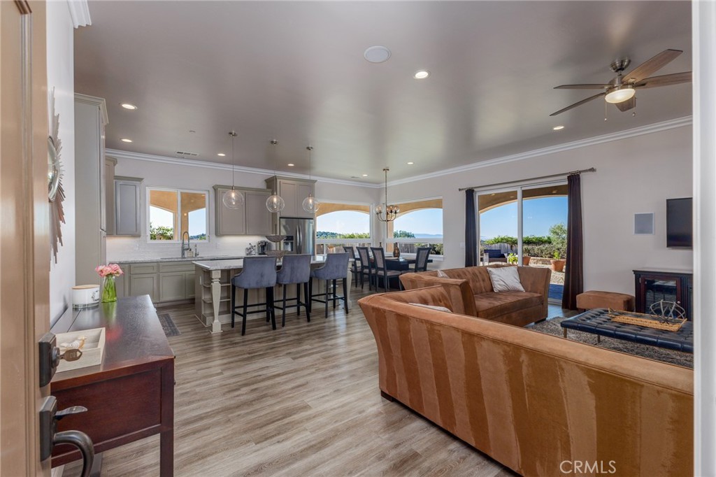 515 Windermere Lane Arroyo Grande, CA 93420 - Photo 52 of 75 a living room with furniture kitchen view and a large window