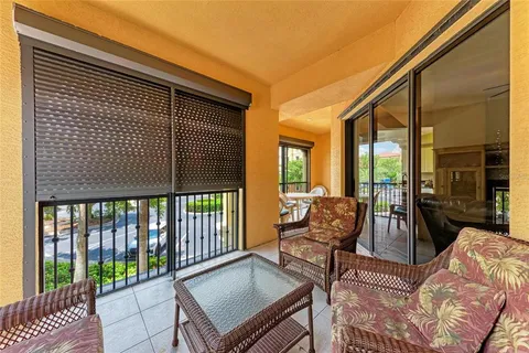 a view of a chairs and tables in the patio