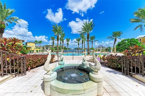a view of swimming pool with outdoor seating and yard