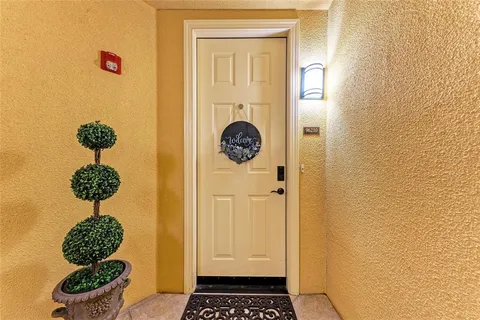 a view of a bathroom with mirror