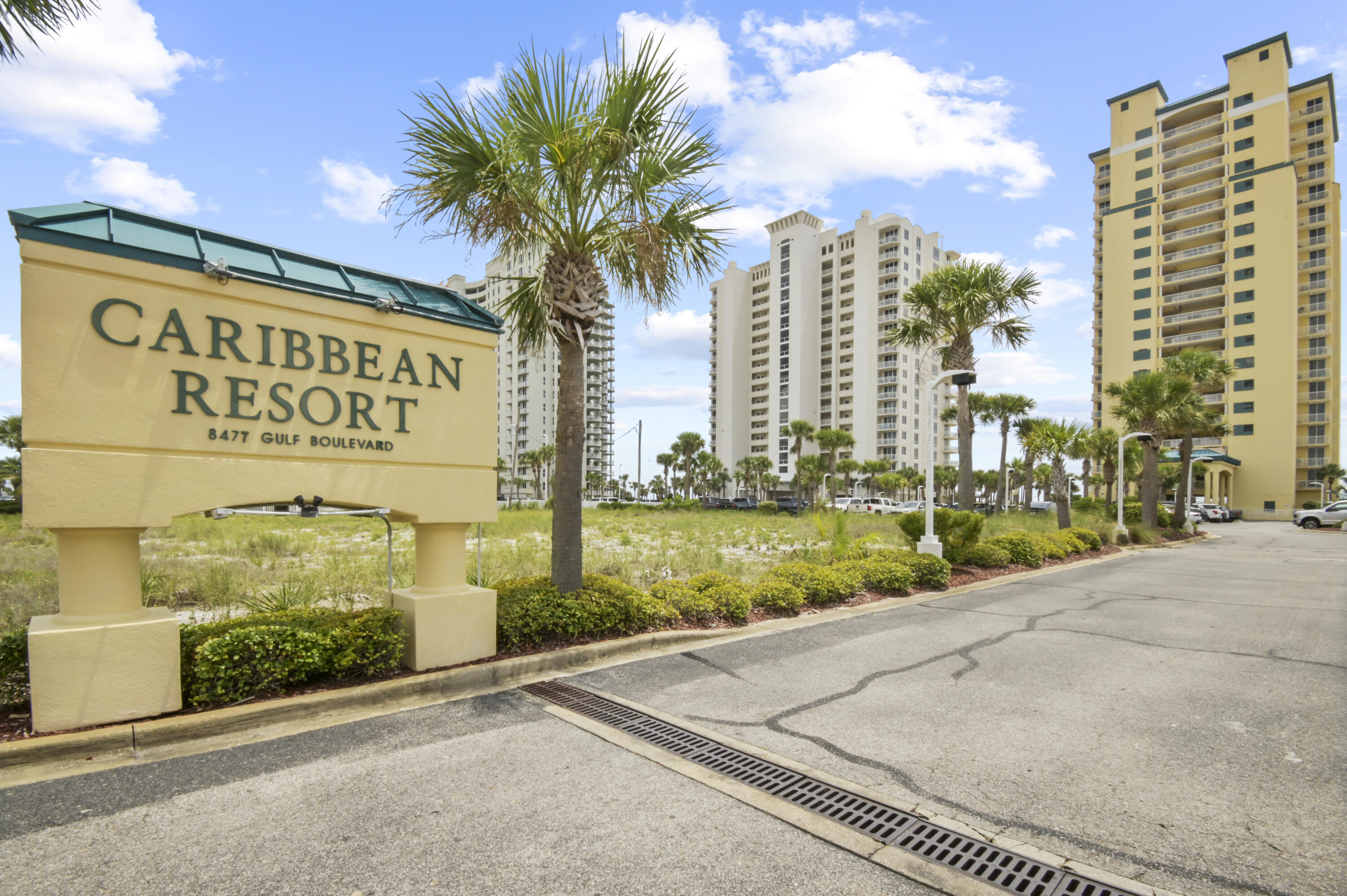 8477 Gulf Boulevard, Unit 902 Navarre, FL 32566 - Photo 33 of 36 a sign on the side of a building