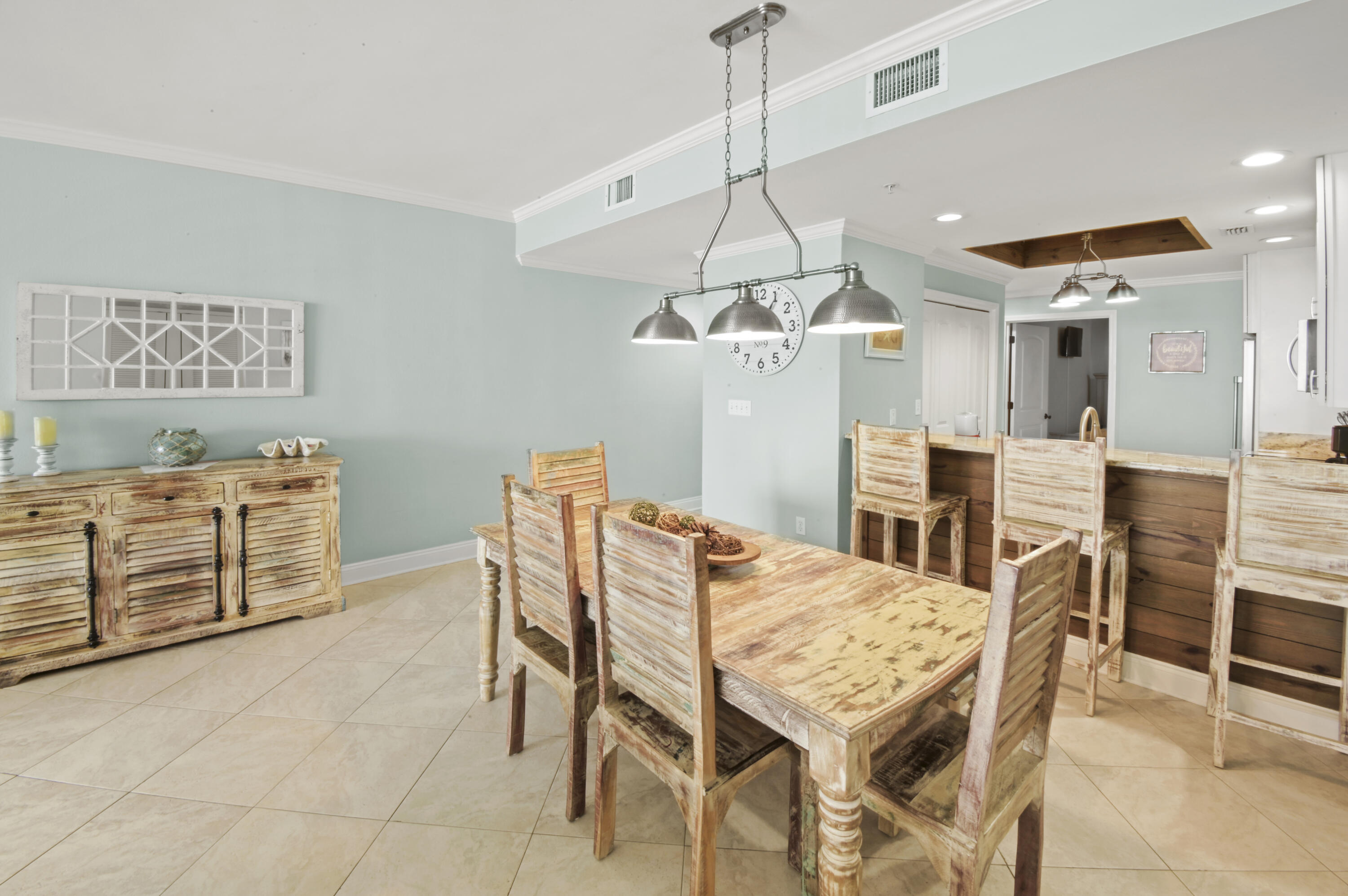 8477 Gulf Boulevard, Unit 902 Navarre, FL 32566 - Photo 7 of 36 a view of a dining room with furniture