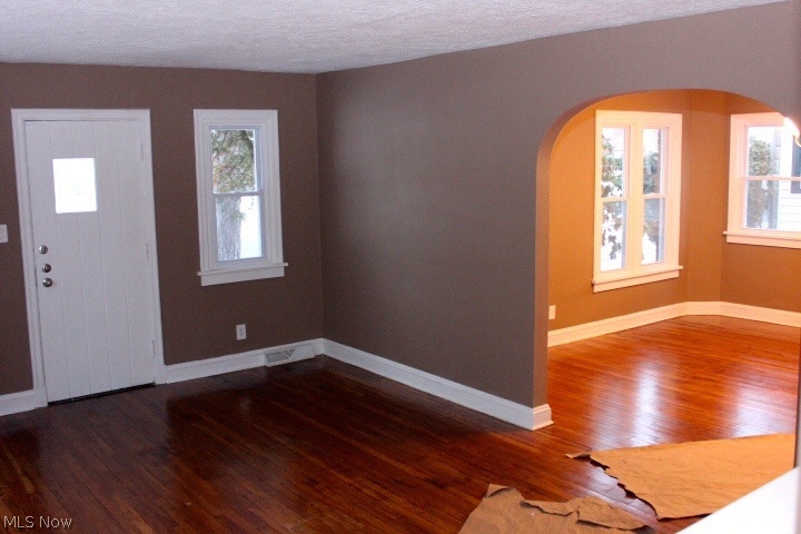 3038 Becket Road Cleveland, OH 44120 - Photo 3 of 14 Archway leading into the living room with fireplace