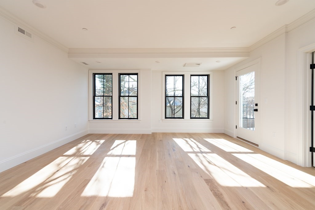 a view of an empty room and window