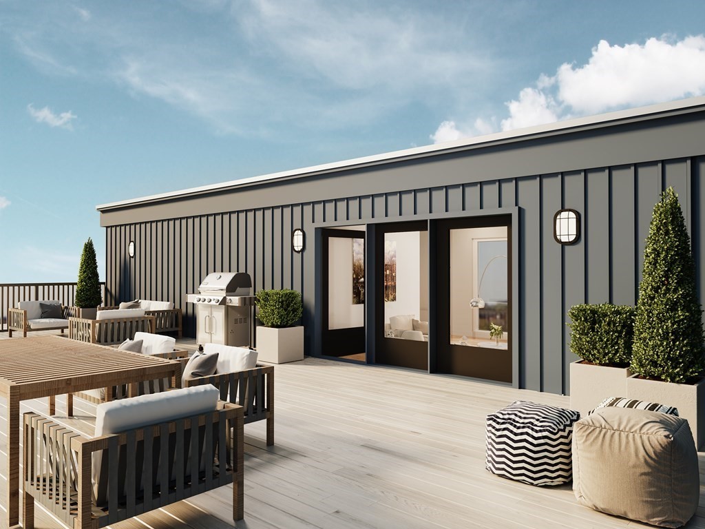 120 Brookside Avenue, Unit 203 Boston, MA 02130 - Photo 18 of 18 a bedroom with furniture and a large window