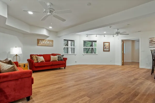 a bath tub sitting in a bathroom next to a sink