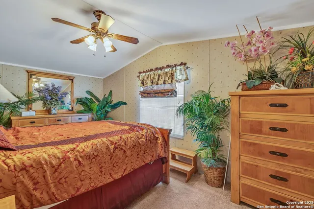 a view of a garage with parked cars