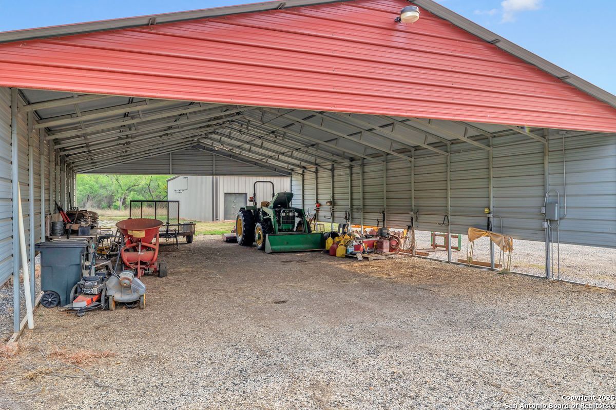 2654 Mathews Rnch Road Dilley, TX 78017 - Photo 34 of 39 a view of a garage with parked cars