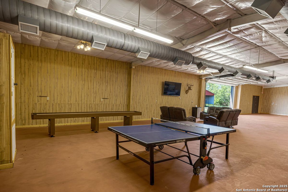 2654 Mathews Rnch Road Dilley, TX 78017 - Photo 38 of 39 a view of a tables and chairs in a patio