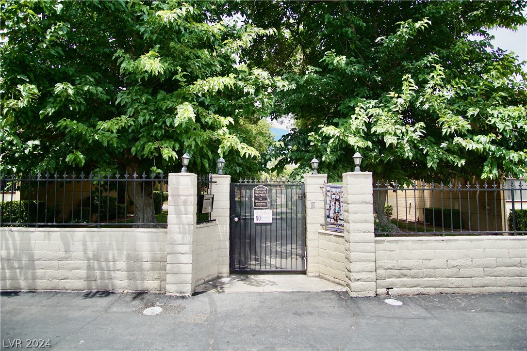 Country Club Shadows entrance gate.  Welcome guests to your home.  Call box & map.