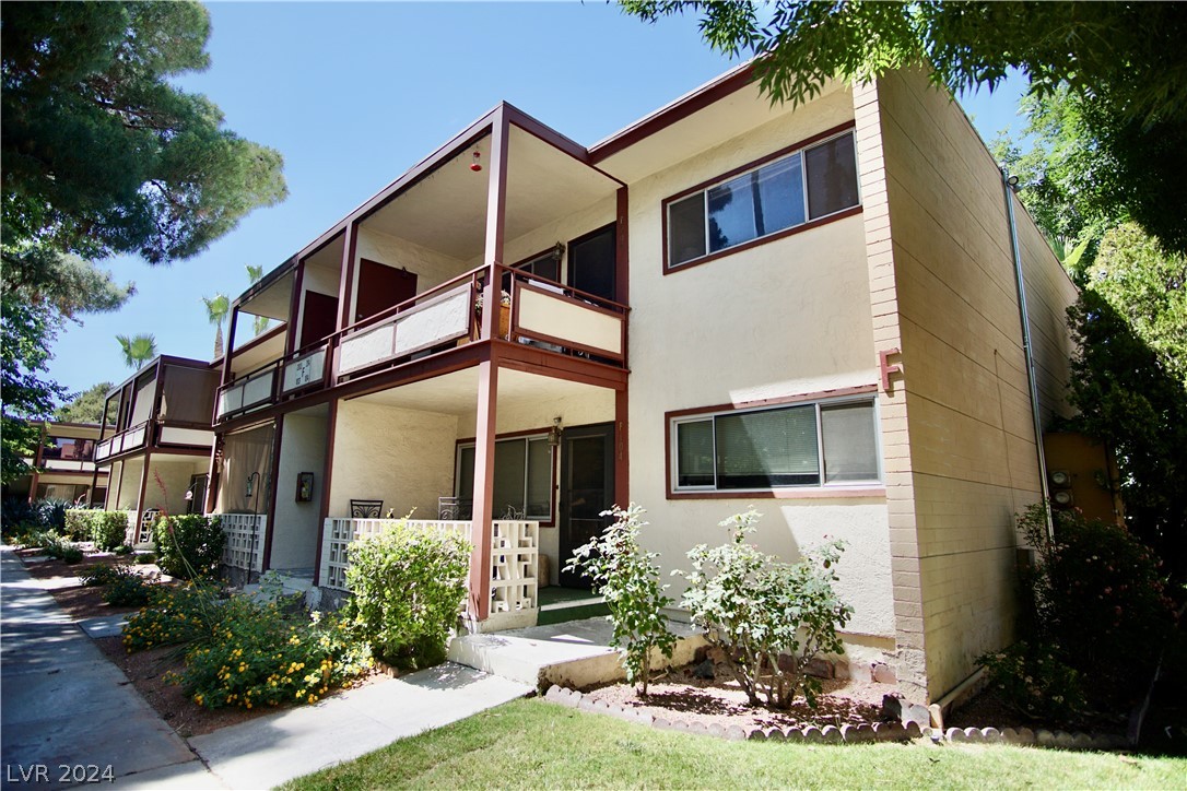 350 East Desert Inn Road, Unit F104 Las Vegas, NV 89109 - Photo 35 of 98 Ground floor unit. Bldg F. Unit 104 bottom, right. HOA handles landscaping.