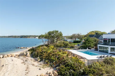 a view of a balcony with an ocean view