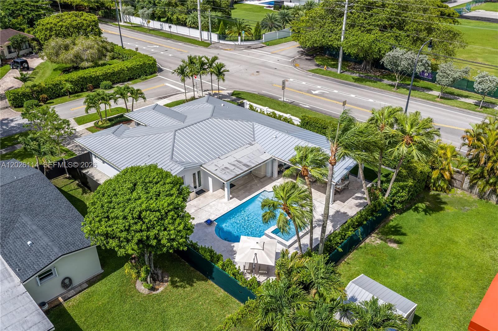 9641 Southwest 66th Street Miami, FL 33173 - Photo 57 of 57 an aerial view of a house with yard swimming pool and outdoor seating