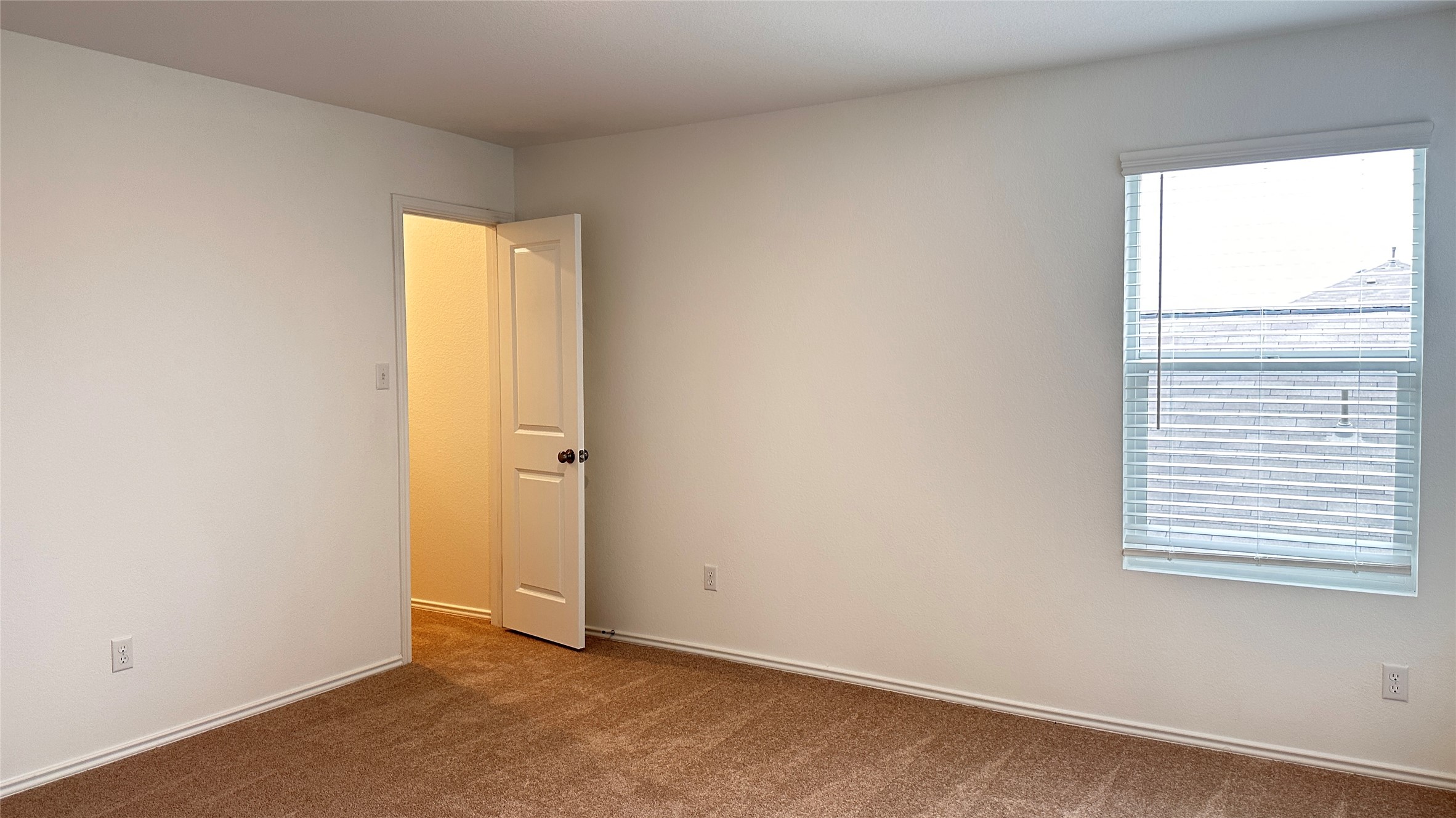 138 Milliner Loop Hutto, TX 78634 - Photo 25 of 36 Spare room featuring dark colored carpet and baseboards