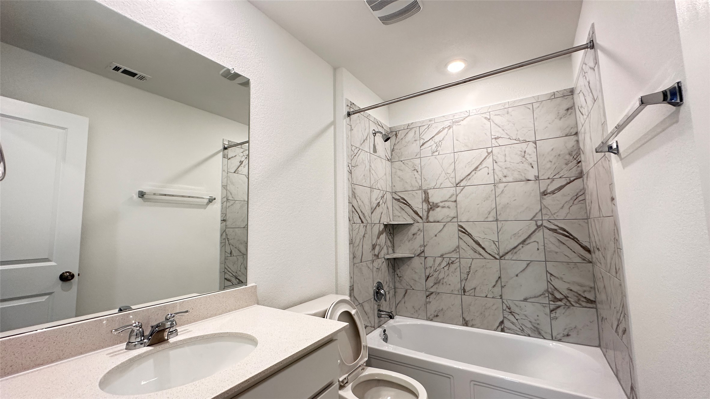 138 Milliner Loop Hutto, TX 78634 - Photo 32 of 36 Full bathroom featuring bathtub / shower combination and vanity