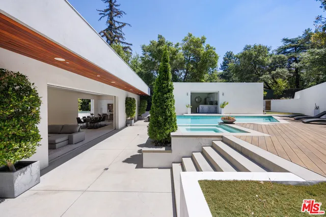 a view of house with patio outdoor seating