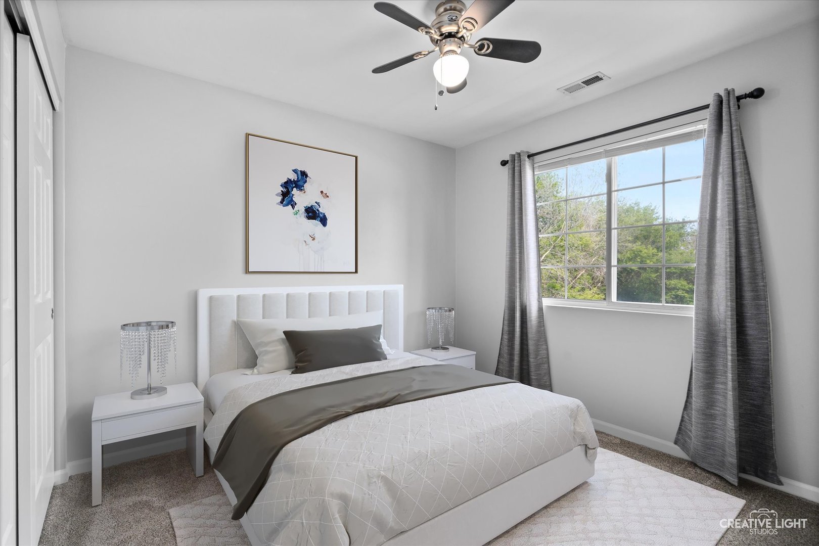 2296 Reflections Drive, Unit 2296 Aurora, IL 60502 - Photo 23 of 32 a bedroom with a large bed and a window