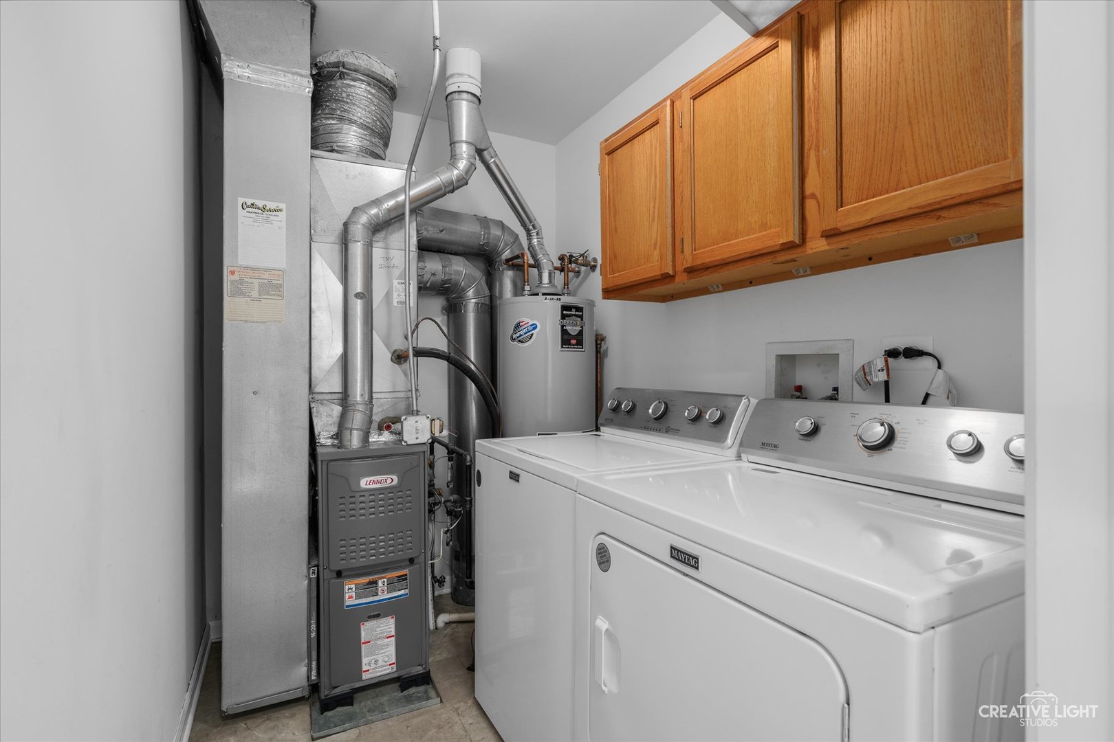 2296 Reflections Drive, Unit 2296 Aurora, IL 60502 - Photo 28 of 32 a utility room with dryer and washer