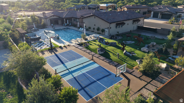 168 South Rancho Santa Fe Virgin, UT 84779 - Photo 45 of 58 Expansive outdoor living area featuring a pool, a dedicated sport court, and a landscaped yard with artificial turf