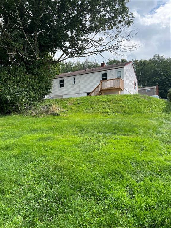2031 McKinney Road Monroeville, PA 15146 - Photo 2 of 13 a house view with a garden space