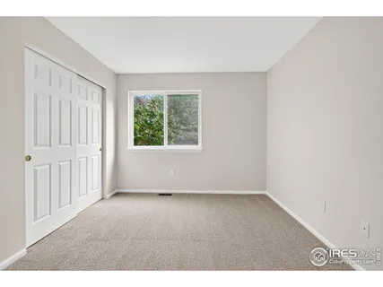 a bathroom with a sink a toilet a mirror and bathtub