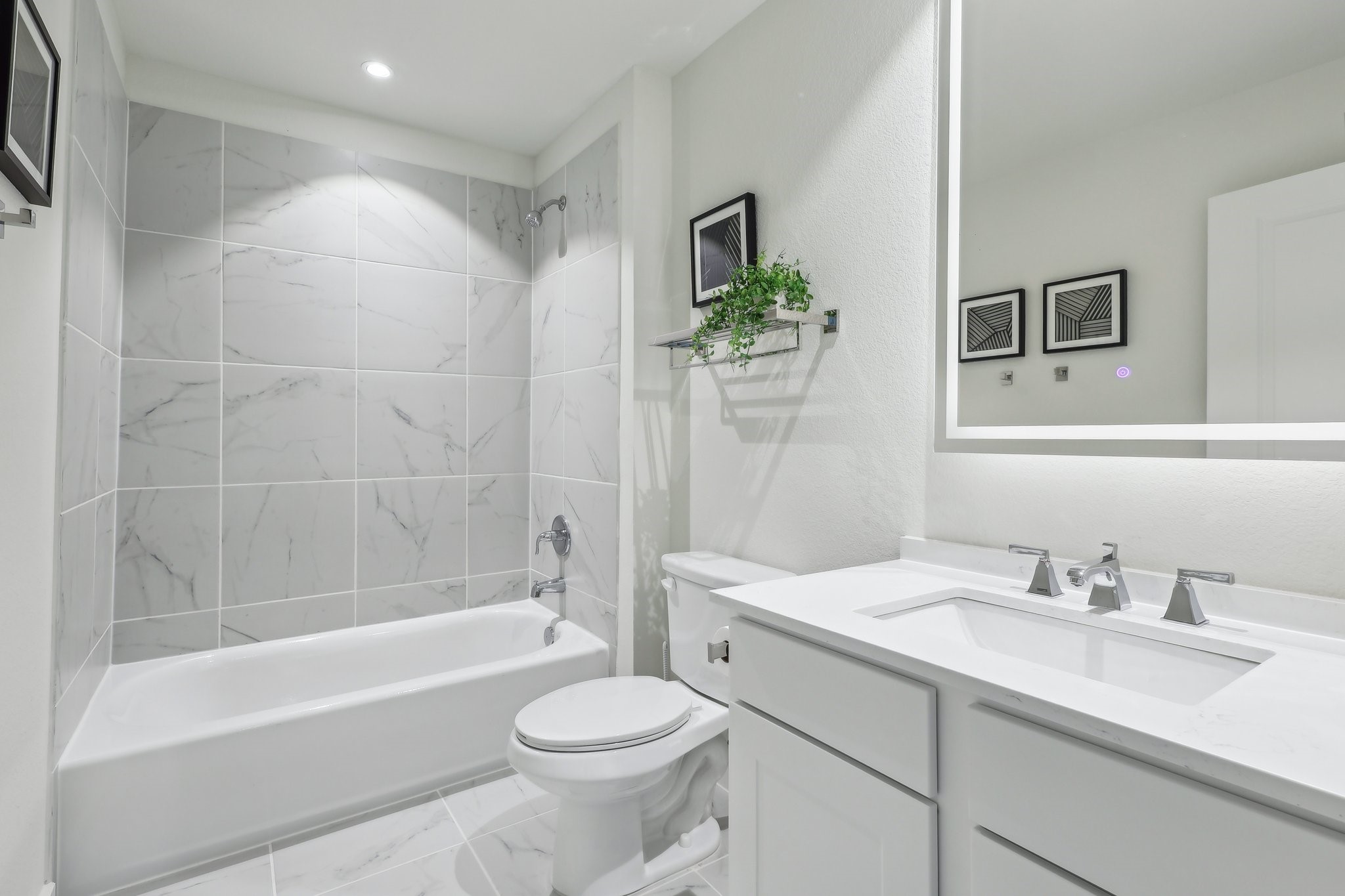 631 Canvas Avenue Fulshear, TX 77441 - Photo 11 of 30 a bathroom with a sink toilet and shower