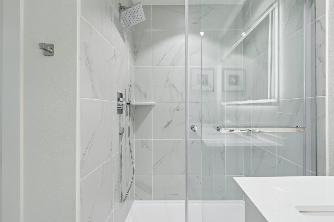 631 Canvas Avenue Fulshear, TX 77441 - Photo 19 of 30 a bathroom with a shower
