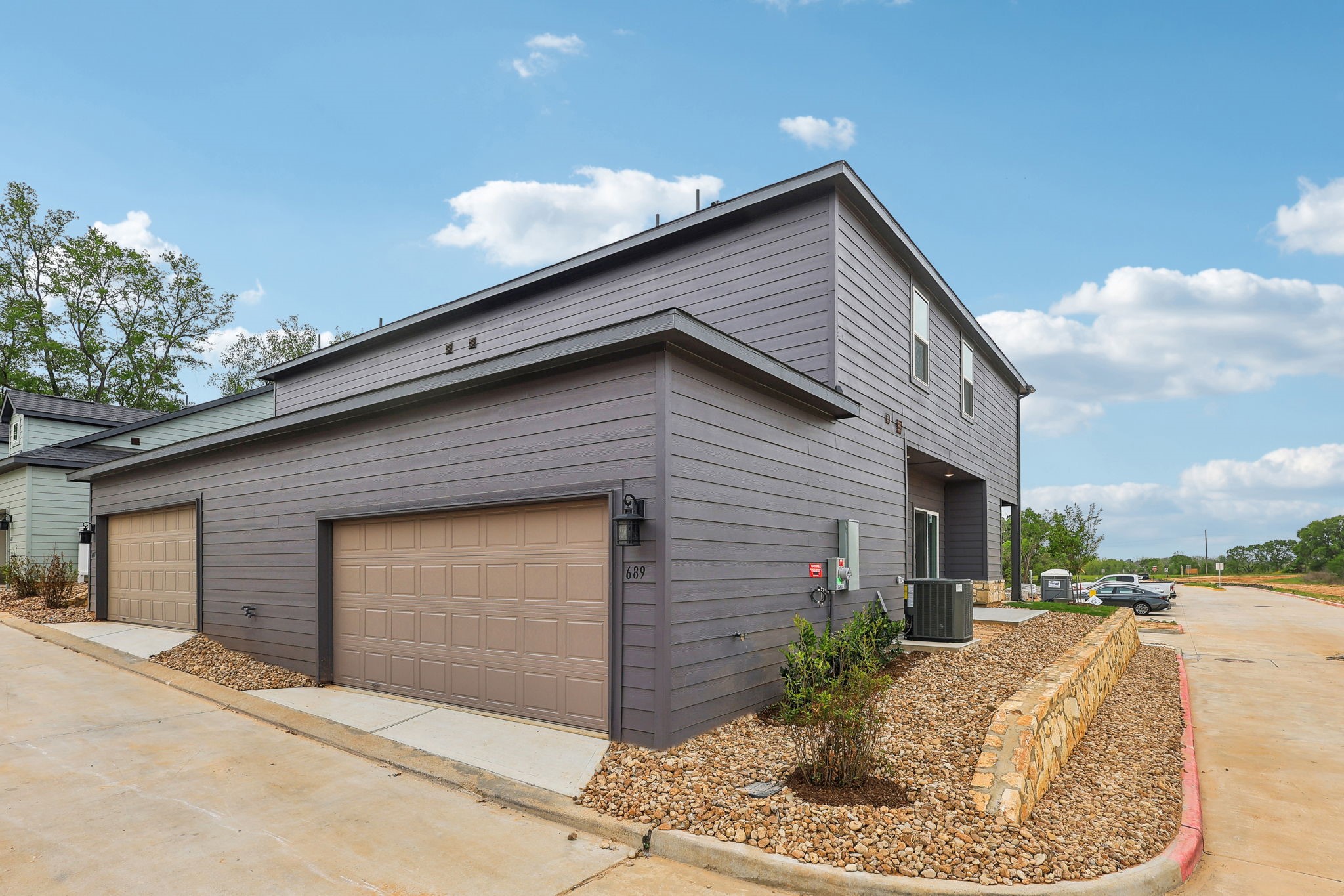 631 Canvas Avenue Fulshear, TX 77441 - Photo 24 of 30 a view of a house with a yard