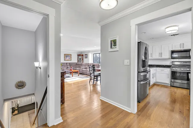 a view of a kitchen cabinets and wooden floor