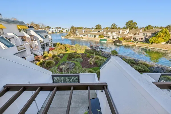 a view of balcony with wooden floor