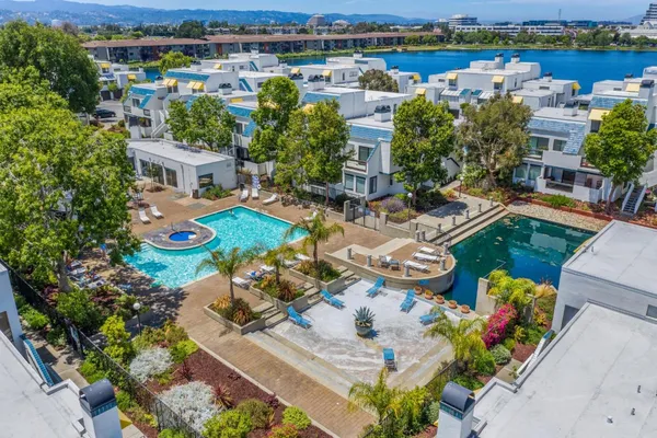 an aerial view of multiple house with outdoor space