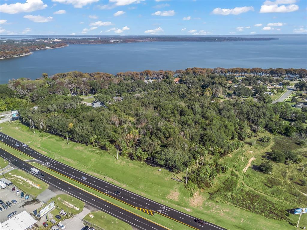 14th Street Leesburg, FL 34748 - Photo 13 of 26 a view of a green yard from a balcony