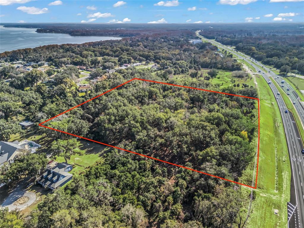 14th Street Leesburg, FL 34748 - Photo 24 of 26 an aerial view of residential house with an outdoor space and seating