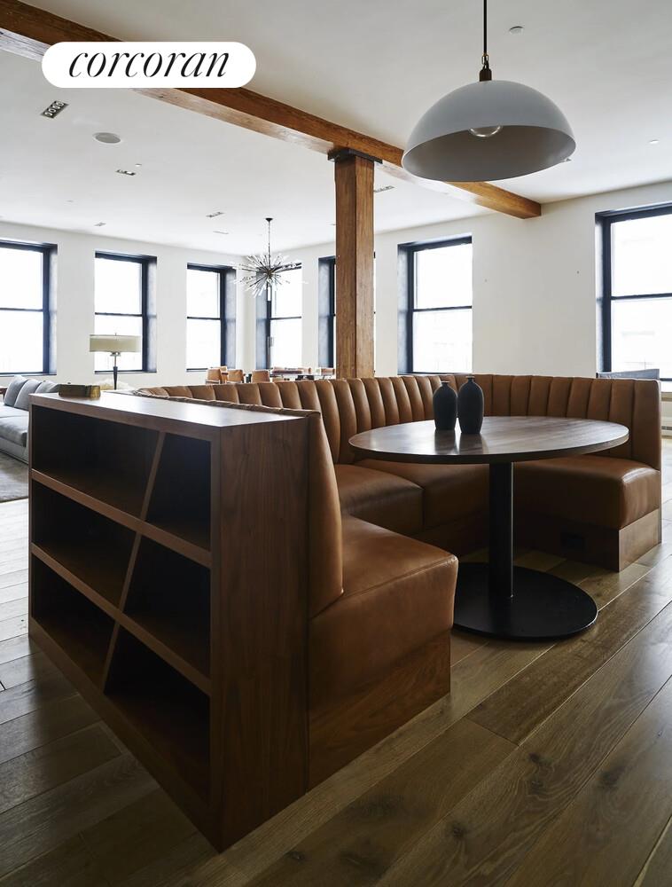 76 Crosby Street, Unit 4 Manhattan, NY 10012 - Photo 20 of 22 a living room with furniture window and wooden floor