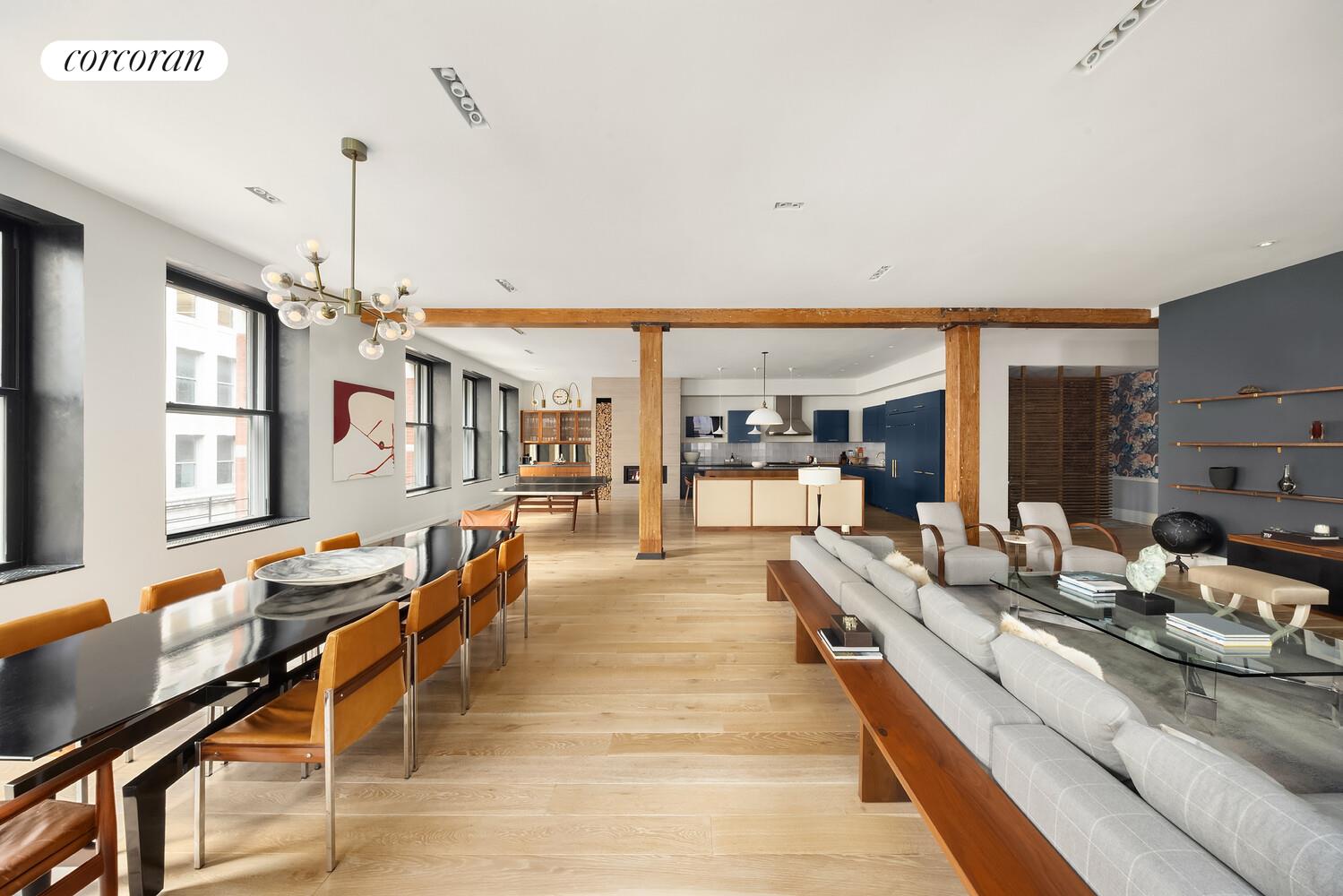 76 Crosby Street, Unit 4 Manhattan, NY 10012 - Photo 3 of 22 a living room with stainless steel appliances kitchen island granite countertop furniture and a kitchen view