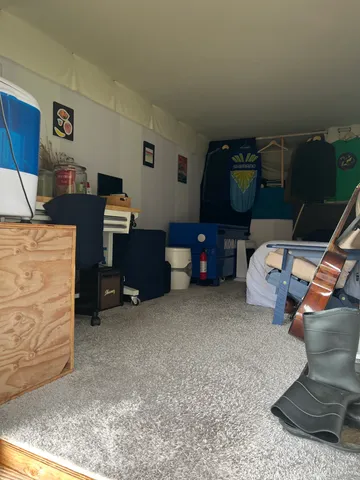 a view of a field with an ocean